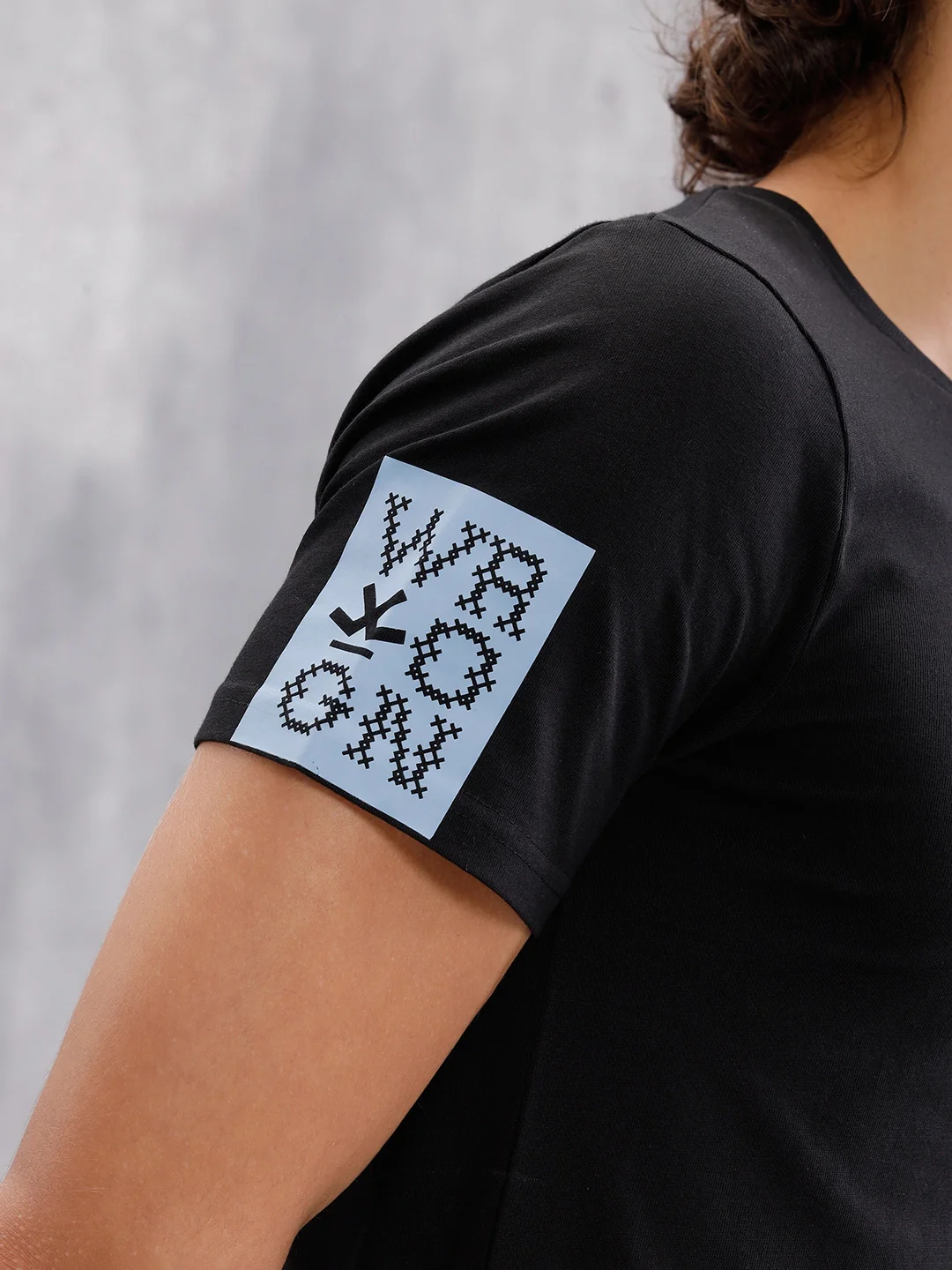 Solid Crew Neck With Contrast Stitch And Print Detail  |  Black - Image 5