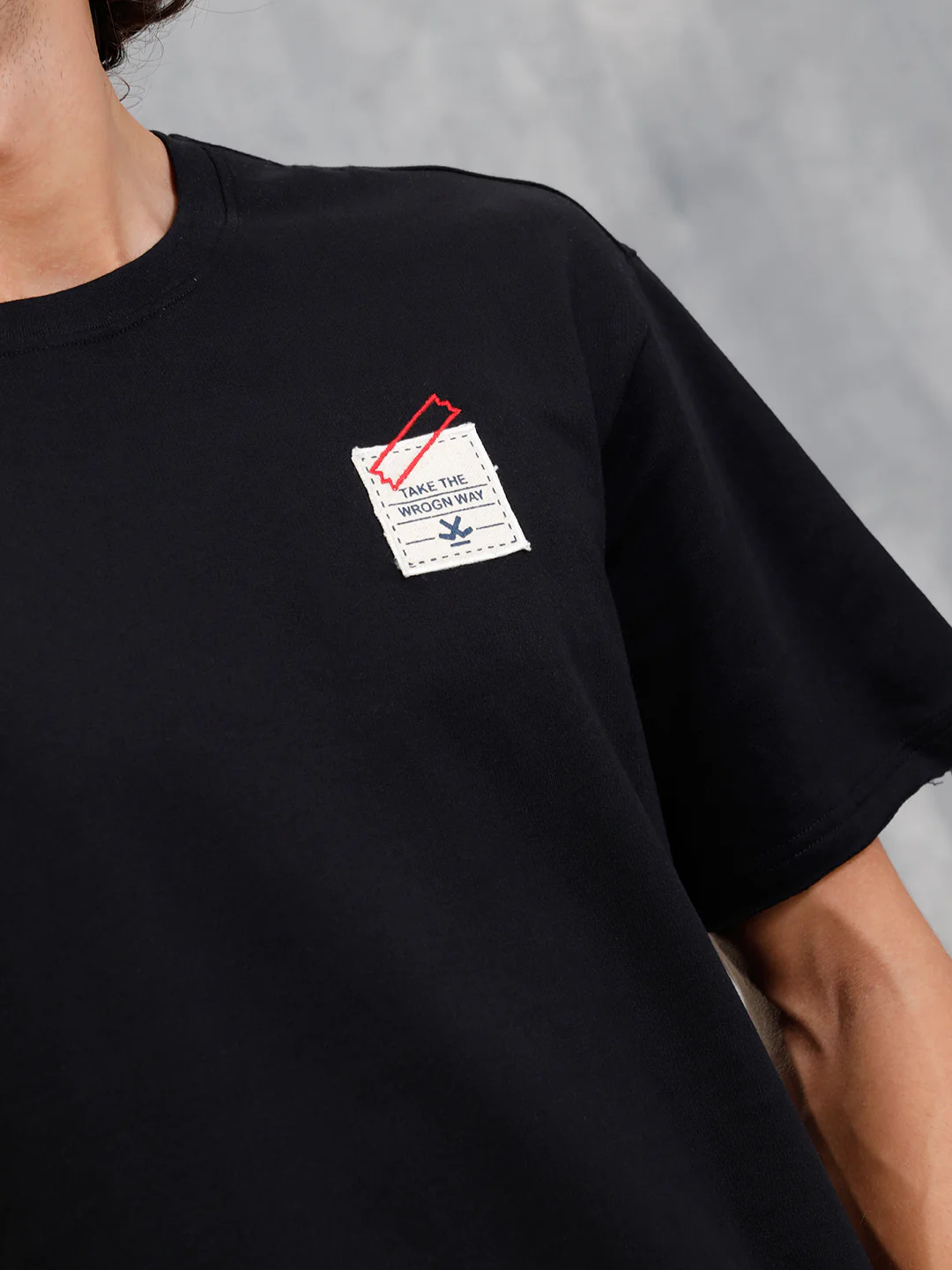 Solid Oversized T-Shirt With Printed Canvas Patch And Raw Edge Detail | Black - Image 4