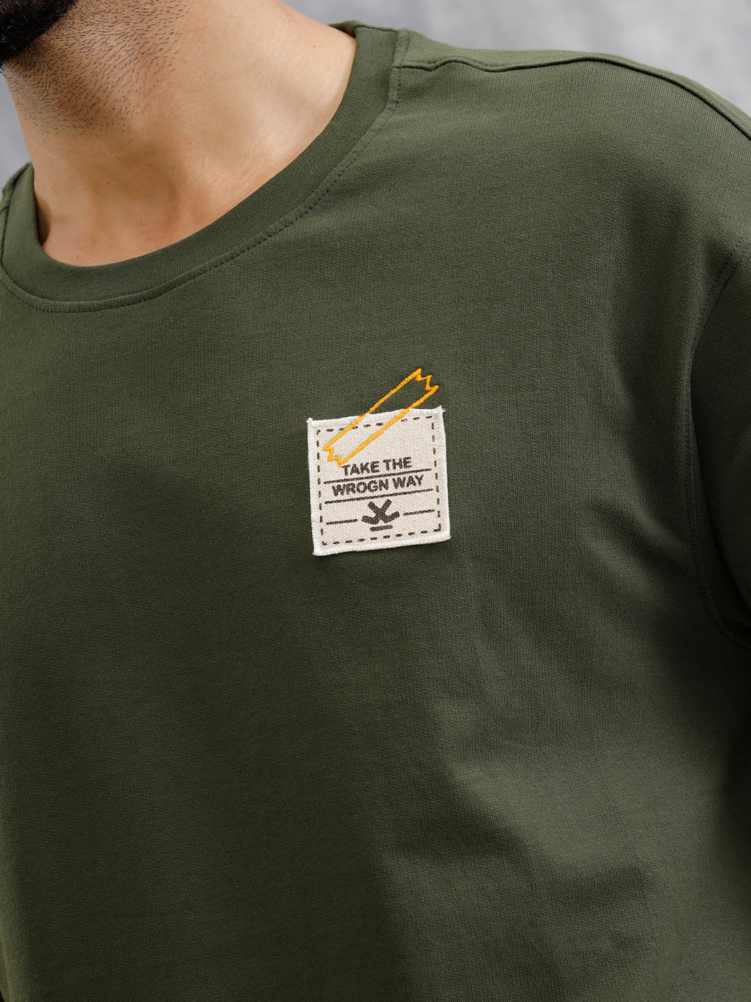 Solid Oversized T-Shirt With Printed Canvas Patch And Raw Edge Detail | Olive - Image 8