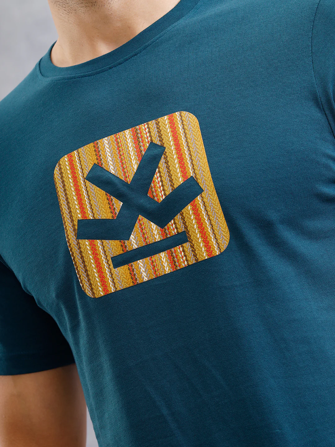 Textured Laser Cut Transfer Print Brand Carrier Crew Neck T-Shirt | Teal - Image 4